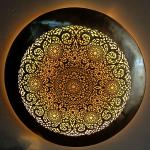 A round copper artwork for wall decoration