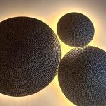 Yellow brass plates for wall decoration.